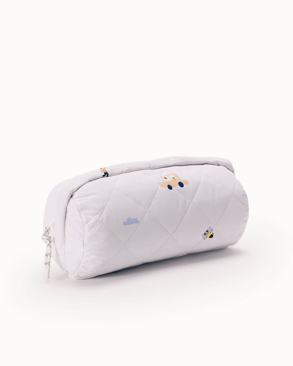 WeeWander travel blanket rolled up showing quilted texture and adventure character print pattern