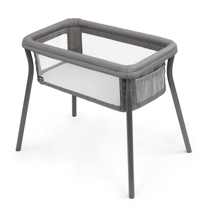 Chicco LullaGo Anywhere portable bassinet-style travel crib in gray with mesh sides
