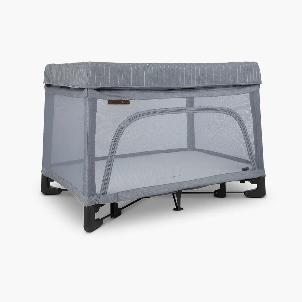 UPPAbaby Remi travel crib in charcoal gray with mesh sides and sturdy base